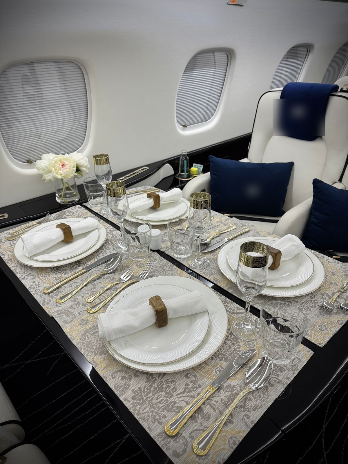 ILE in-flight catering — table service aboard a private charter, photo: ILE